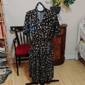 Elegant Black and Cream Bird Print Dress